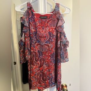 Casual shirt with cutout sleeves.